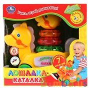 КАТАЛКА-ЛОШАДКА "УМКА" НА БАТ. СВЕТ+ЗВУК, РУССИФИЦ., 7 РАЗВИВАЮЩ. ФУНКЦИЙ В РУСС. КОР. в кор.2*12шт | фото №0